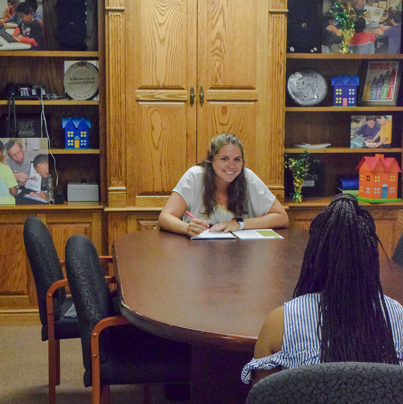 Young women conducting a mock interview workforce lab with student